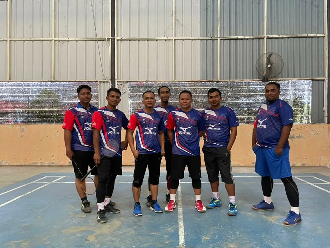 A local e-sports team proudly wearing their custom jerseys.